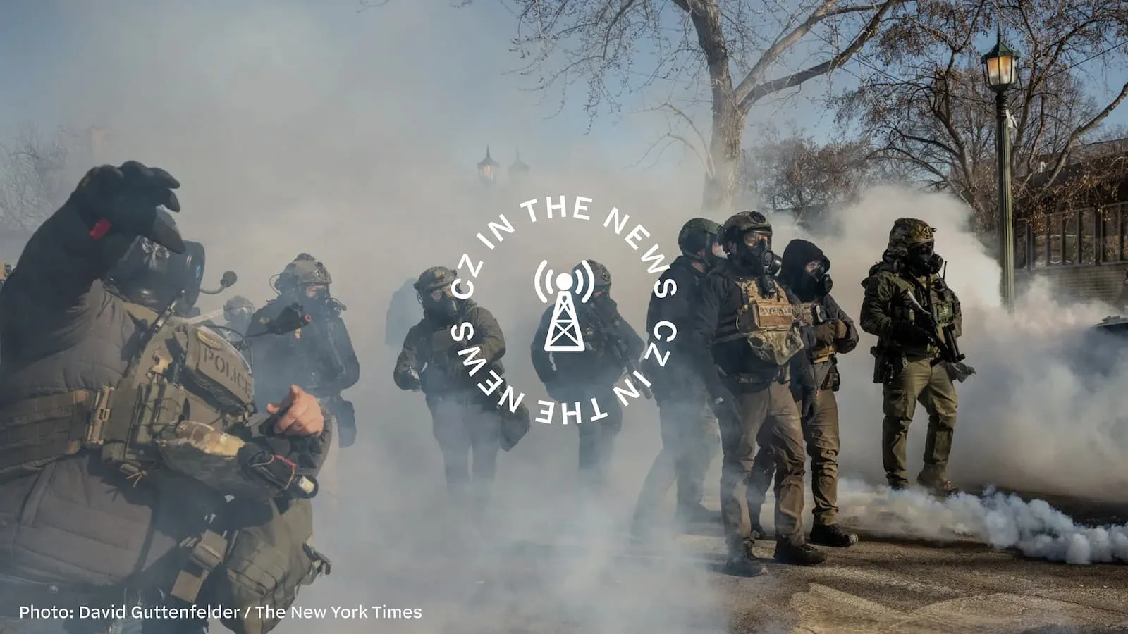 A group of armed soldiers in tactical gear moving through thick smoke in an outdoor setting.